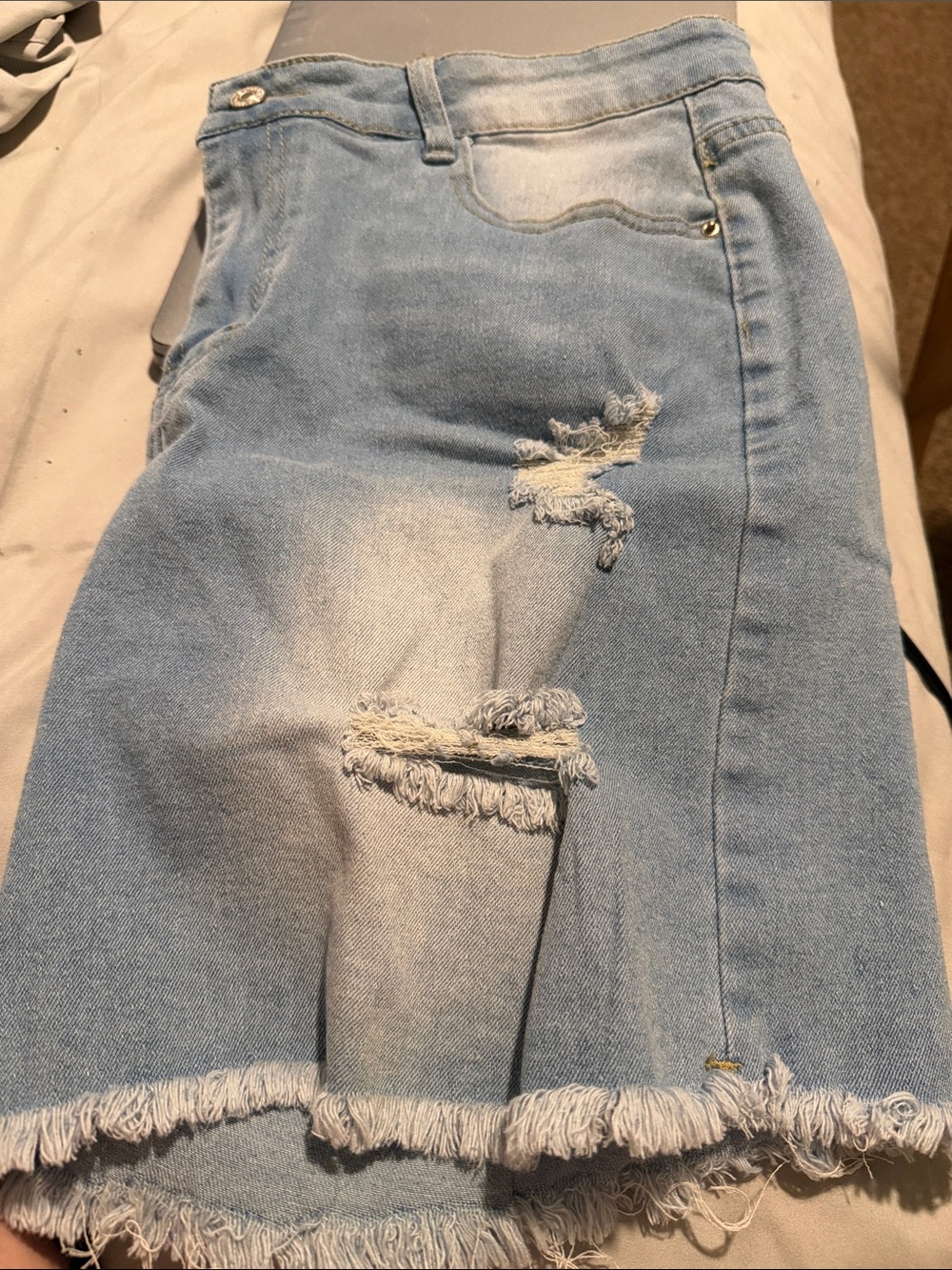 Light Wash Distressed Denim Skirt